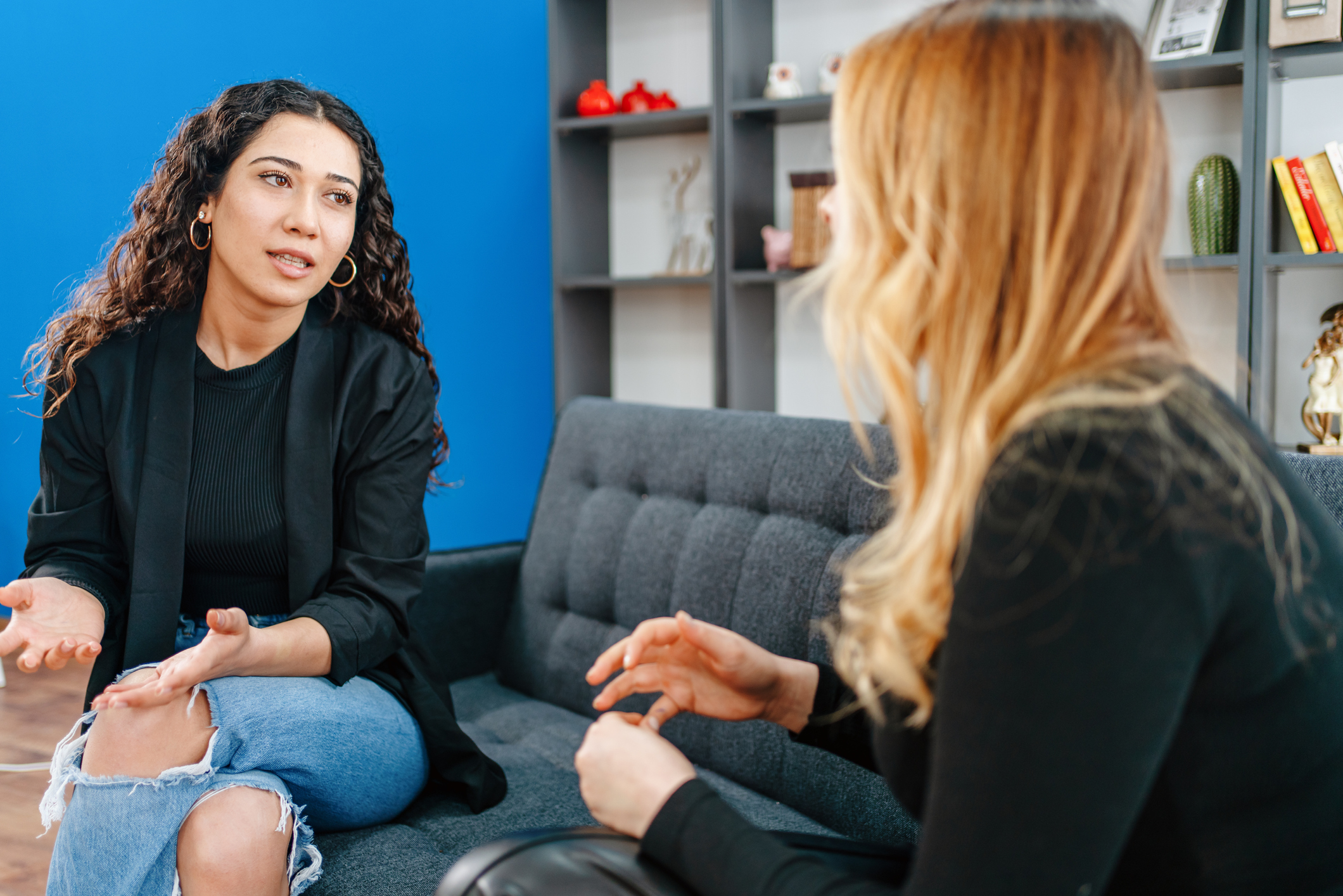 young women having one on one counselling meeting